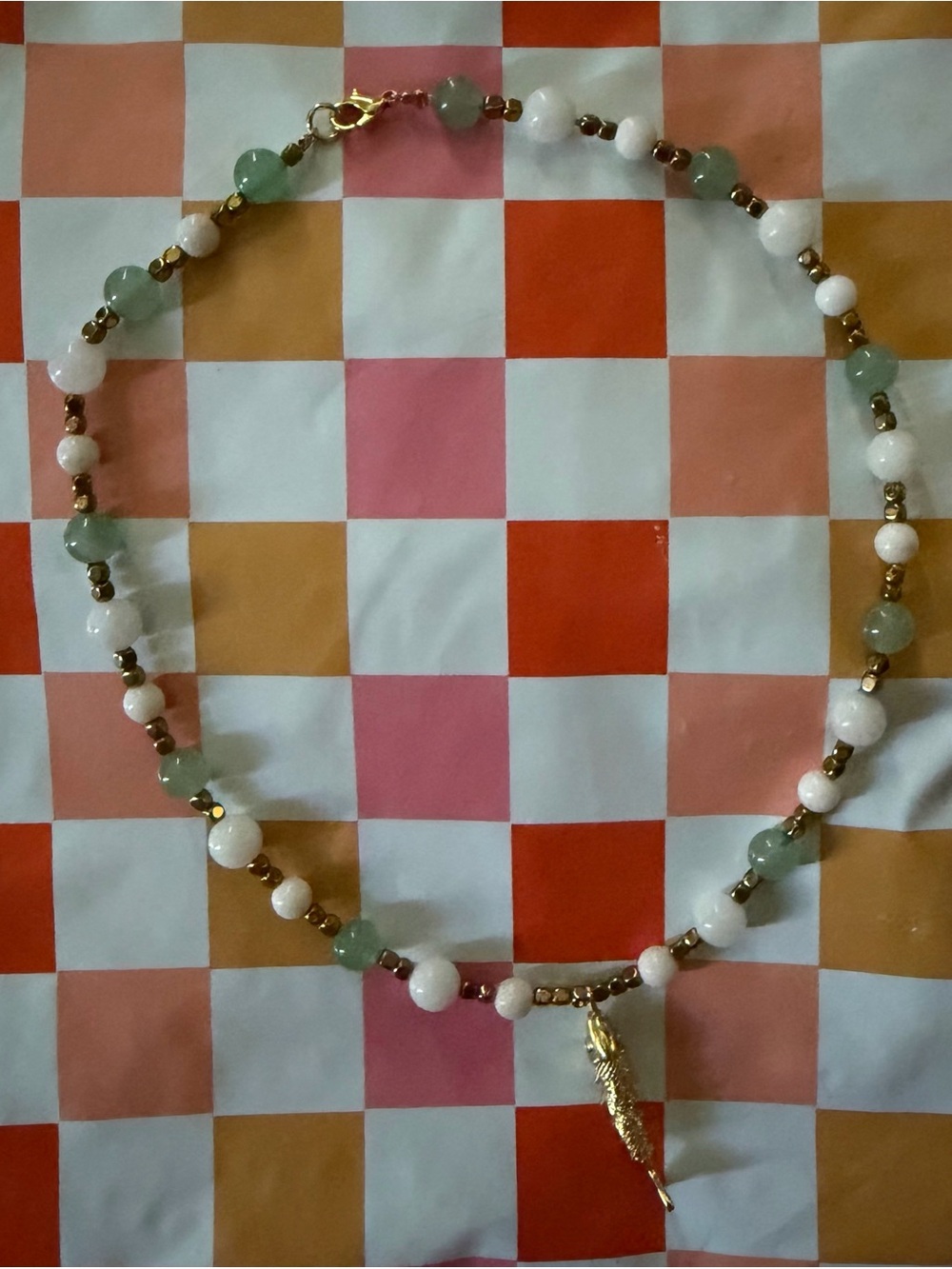 Hand Crafted Green, White and Gold Beaded Necklace with Feather Charm